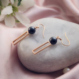 Golden Orb Elegance Ceramic Silver Earrings