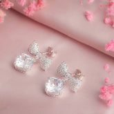 Intricate Bowtie Elegance Solitaire Silver Earrings